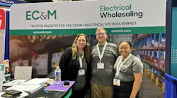 The EC&M editorial team shows off the Everyday Electrician shirts, which NECA attendees can get for free if they visit Booth No. 2028.