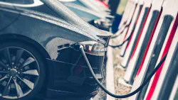 Electric Cars Charging Station Closeup Photo. Vehicle Rechargeable Batteries Charing. Future of Transportation.