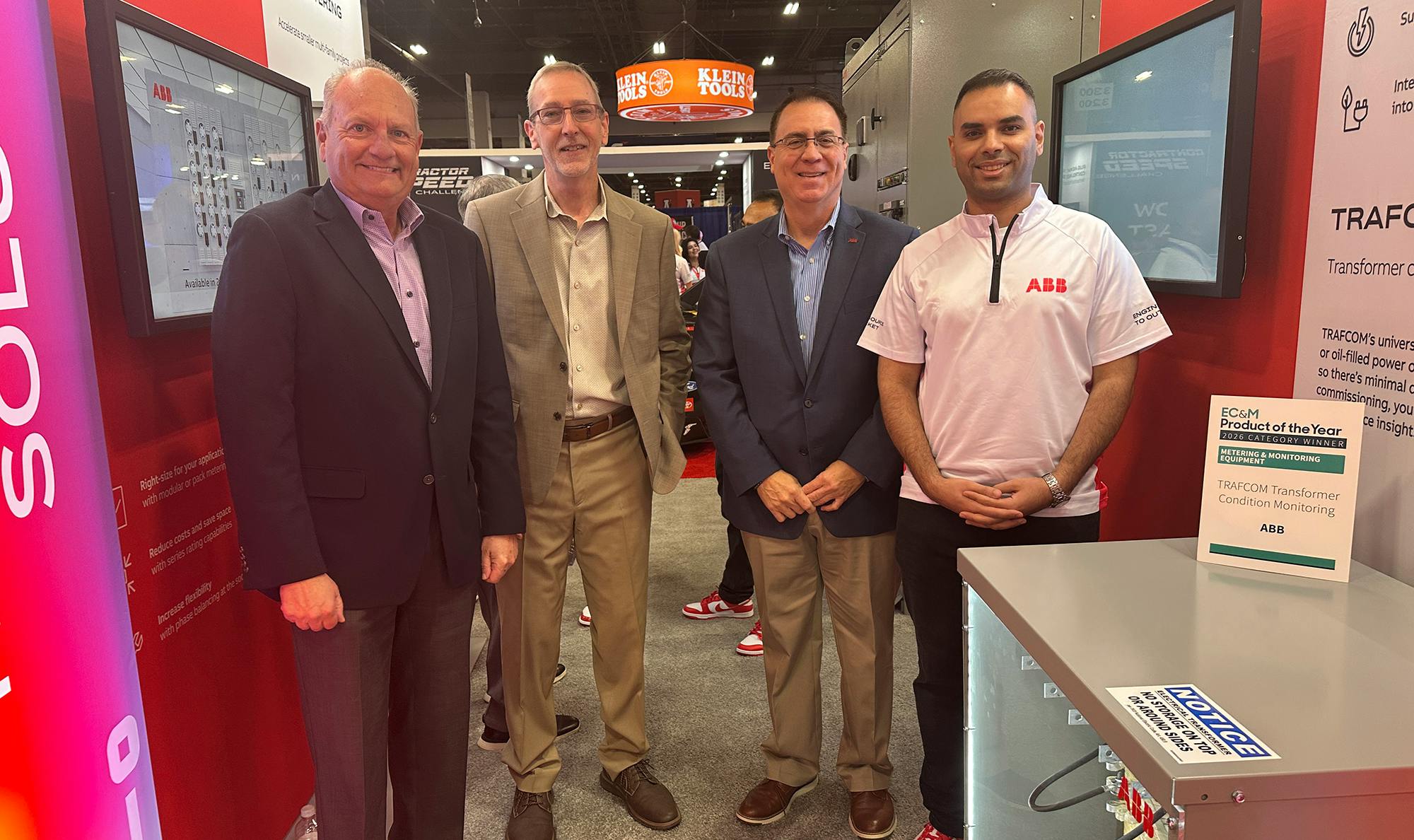 The photo above shows EC&amp;M's Mike Eby (second from left), VP of Content Strategy for the Buildings and Construction Group, presenting Norm Sowards, Senior Vice President of Marketing and Strategy, ABB Electrification (left), Javier Lopez, Product Marketing Director, ABB, and Omar Ibrahim, Global Product Manager, ABB with the Silver Product of the Year award.