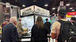 From left to right: Electrical Wholesaling Editor-in-Chief Jim Lucy, EC&M Editor-in-Chief Ellen Parson, and Trevor Ottmann, the Everyday Electrician, visit the Southwire booth.